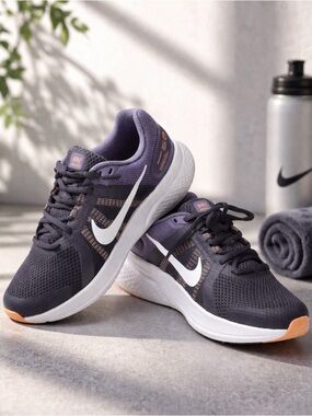 Nike Women’s Purple and White Mesh Running Sneakers